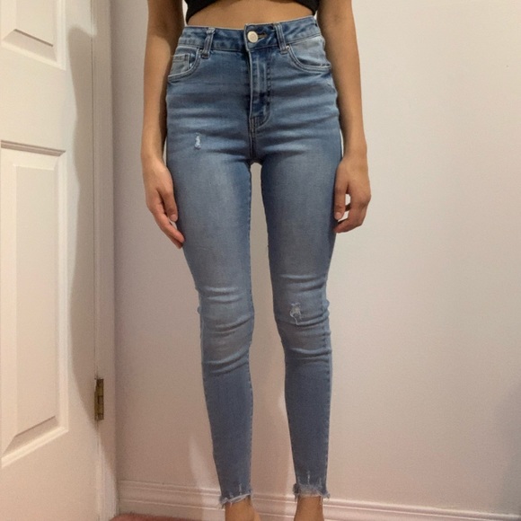 Denim - Light blue slightly distressed skinny jeans